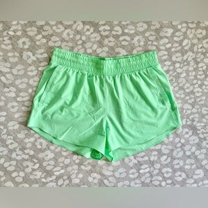 Under Armour XL lime green athletic running shorts
